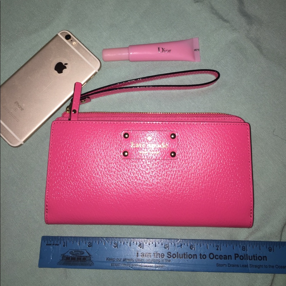 Kate Spade Tech Wallet! Hot pink! Measures 8 x 4 1/2.  EUC